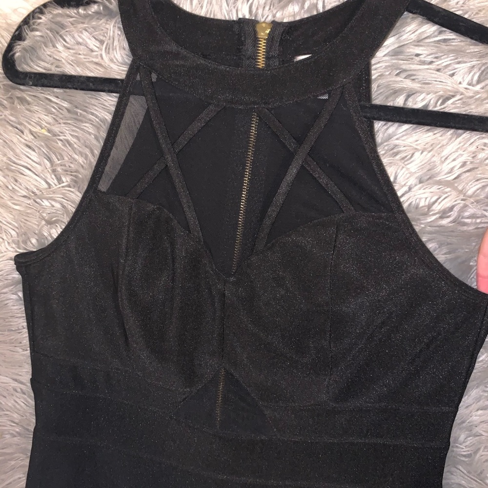 - 🦋 Black Sleeveless High Neck Skater Dress